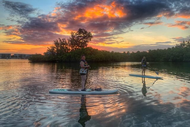 First timers enjoying a colorful sunrise in Jupiter